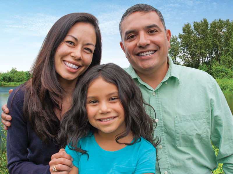 Mother, father and daughter enjoying the outdoors.